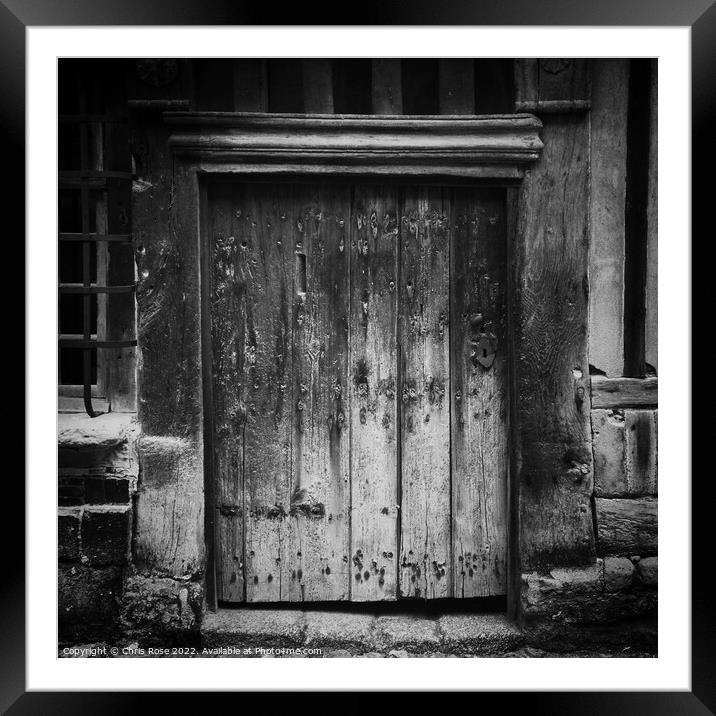 Weathered wooden door Framed Mounted Print by Chris Rose