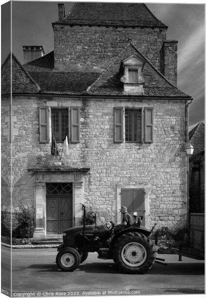 Domme, town Hall and tractor Canvas Print by Chris Rose