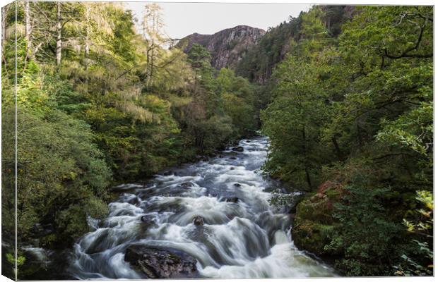 Water flowing down the Aber Glaslyn Pass Canvas Print by Jason Wells