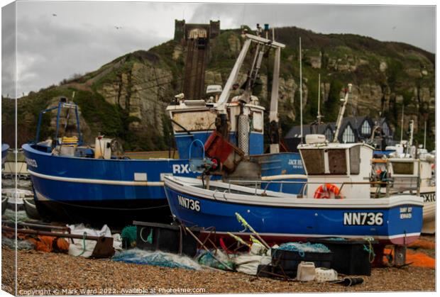 Fishing Boats on the Stade Beach in Hastings. Canvas Print by Mark Ward