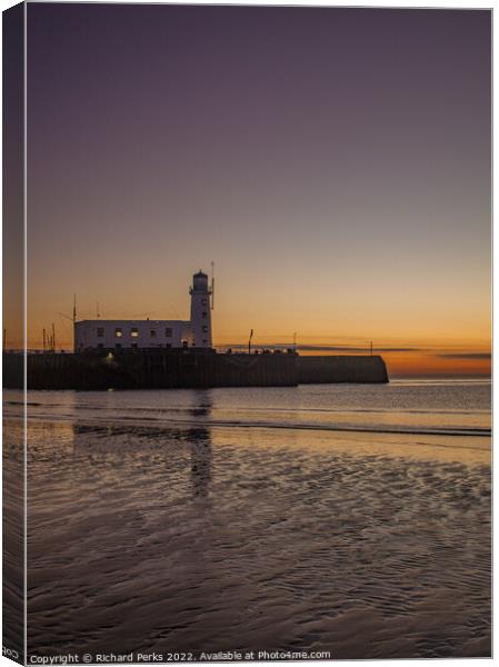 Scarborough Lighthouse at dawn Canvas Print by Richard Perks