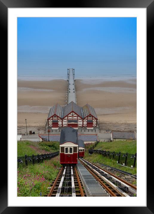 Saltburn cliff lift and pier on a summers day Framed Mounted Print by Kevin Winter