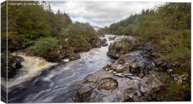 The fast flowing river through Glen Orchy Canvas Print by Derek Daniel