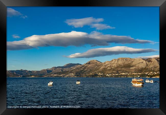 Blue sky over mountains on adriatic coast Framed Print by Sergey Fedoskin