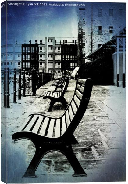 Row of Benches Canvas Print by Lynn Bolt