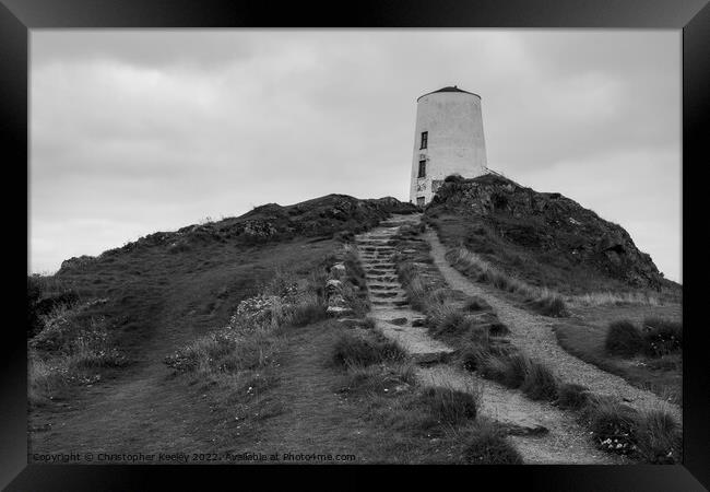Monochrome Twr Mawr lighthouse Framed Print by Christopher Keeley