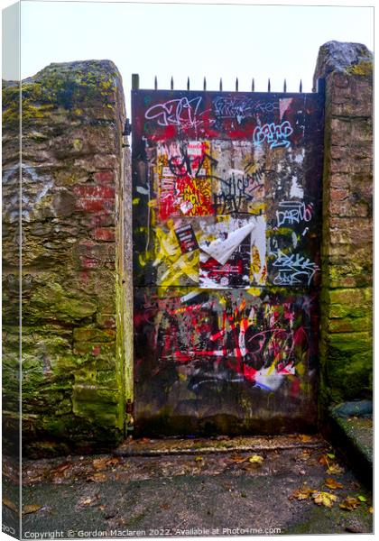 Graffiti covered doorway, Falmouth Canvas Print by Gordon Maclaren