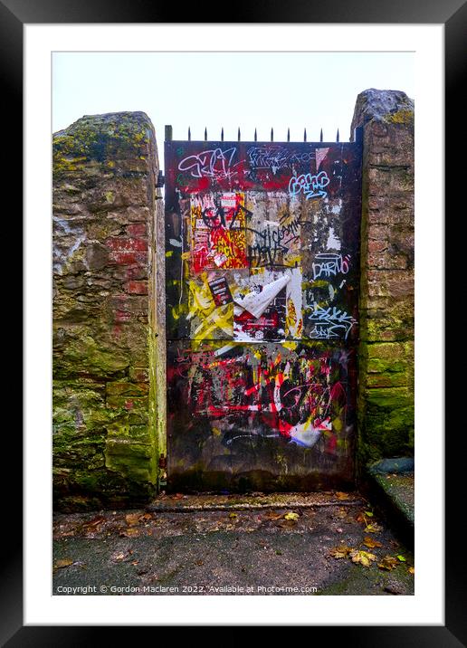 Graffiti covered doorway, Falmouth Framed Mounted Print by Gordon Maclaren