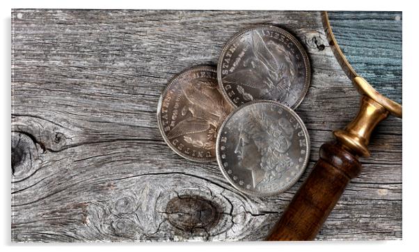 Collection of US Morgan silver dollars with magnifying glass  Acrylic by Thomas Baker