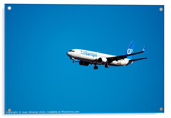 Boeing 737-800 passenger aircraft of the airline Air Europa flying before landing against sky Acrylic by Juan Jimenez
