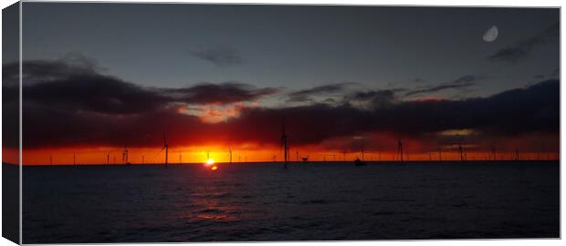 Windfarm sunset Canvas Print by Russell Finney
