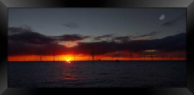 Windfarm sunset Framed Print by Russell Finney