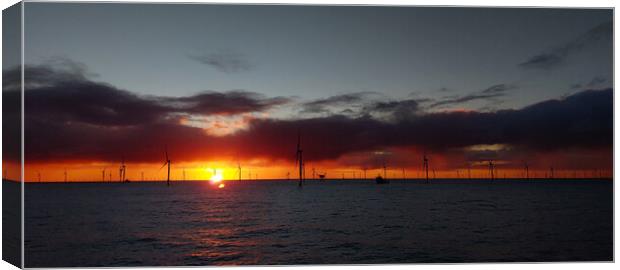 Sunset in German windfarm Canvas Print by Russell Finney