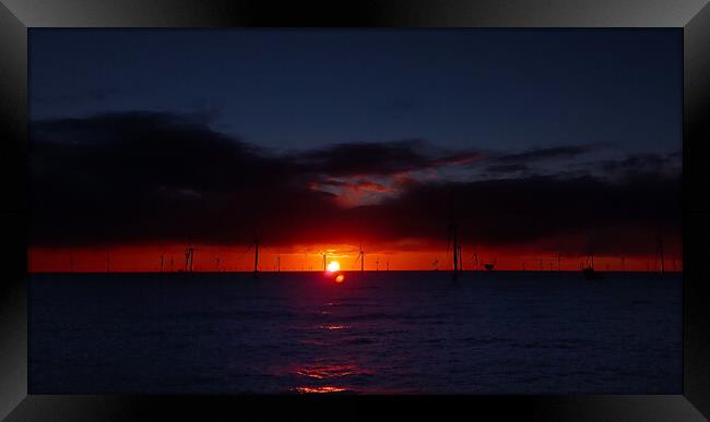 Sunset in Windfarm Framed Print by Russell Finney