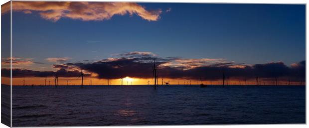 Sunset in renewable windfarm Canvas Print by Russell Finney