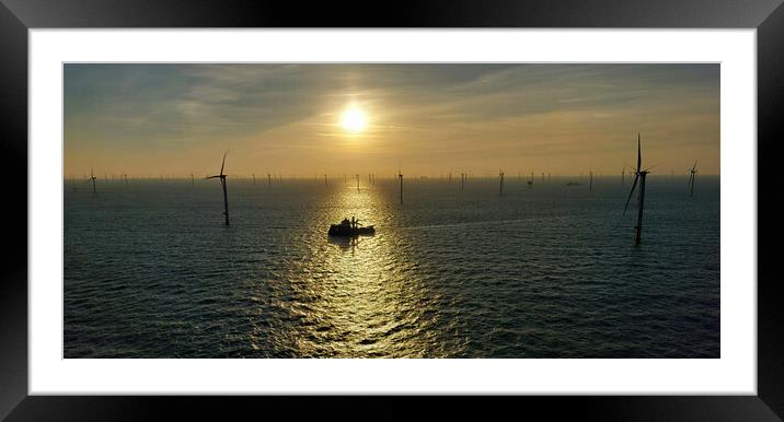 Sunset in wind turbines Framed Mounted Print by Russell Finney