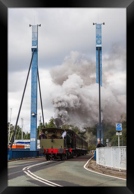 Steam train going over the swing bridge Framed Print by Jason Wells
