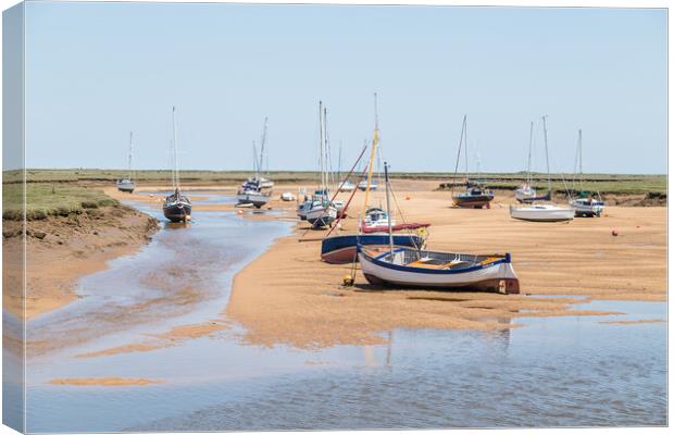 Boats by the quay at Wells next the Sea Canvas Print by Jason Wells