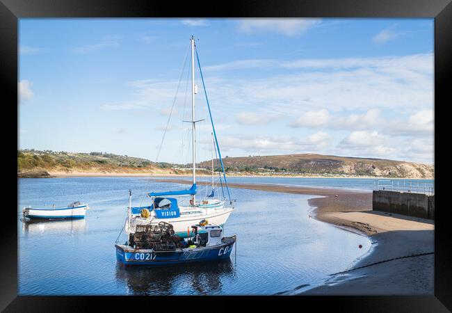 Boats moored at Abersoch Framed Print by Jason Wells