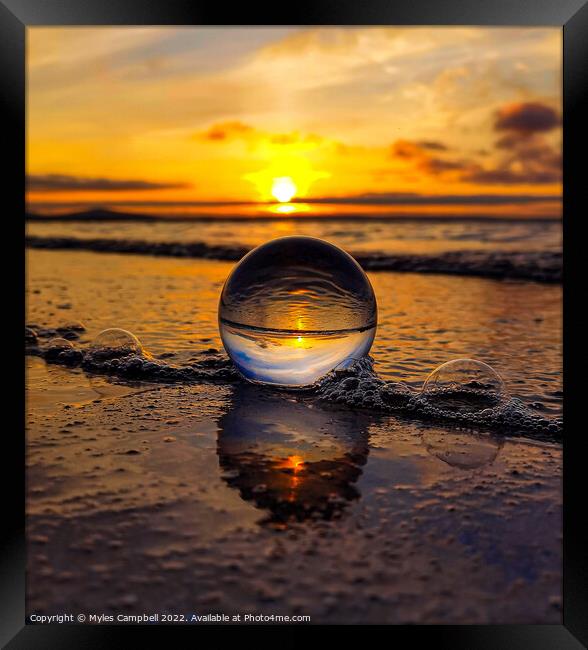 Glassball meets the tide Framed Print by Myles Campbell
