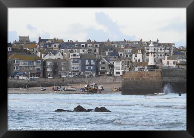 Close-up view of buildings and lighthouse in St Ives, Cornwall Framed Print by Joan Rosie
