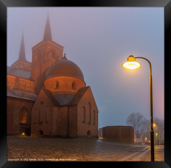Roskilde cathedral and a streetlight in a misty winter night  Framed Print by Stig Alenäs