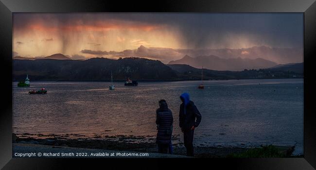 A shower of snow partially obstructs the sunset colour. Framed Print by Richard Smith