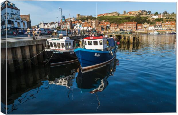 Fishing boats in Whitby harbour Canvas Print by Jason Wells