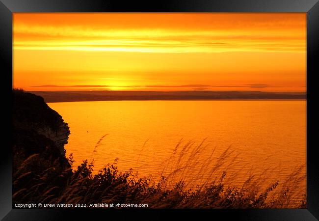 Sunset over the Yorkshire coast. Framed Print by Drew Watson