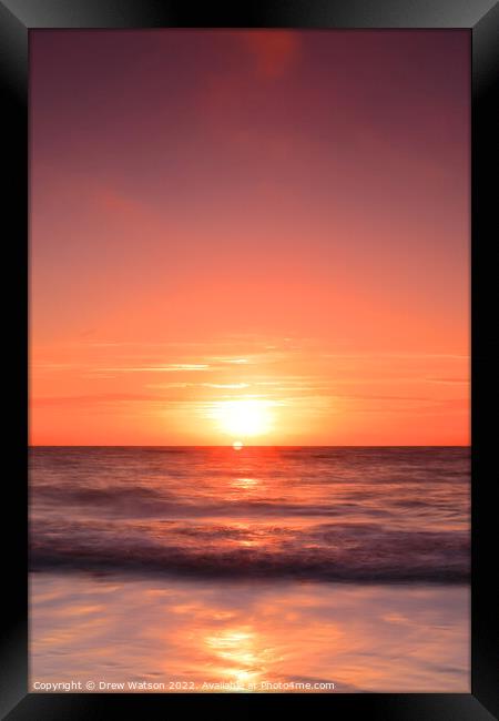 Sunrise over the sea. Framed Print by Drew Watson