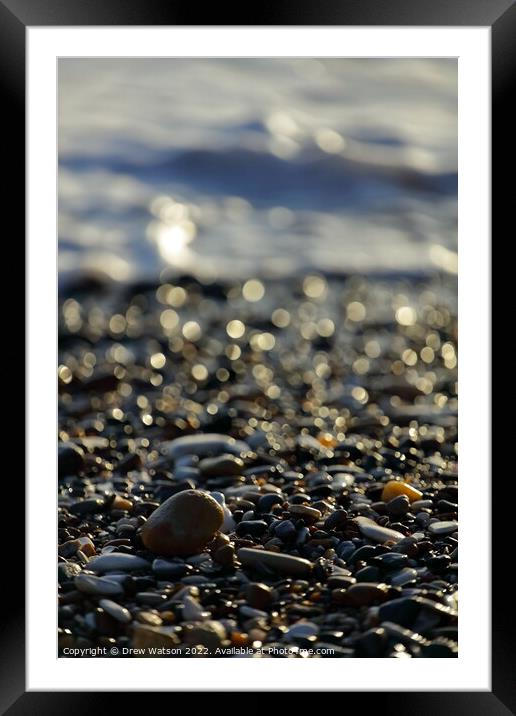 Stones on the beach Framed Mounted Print by Drew Watson