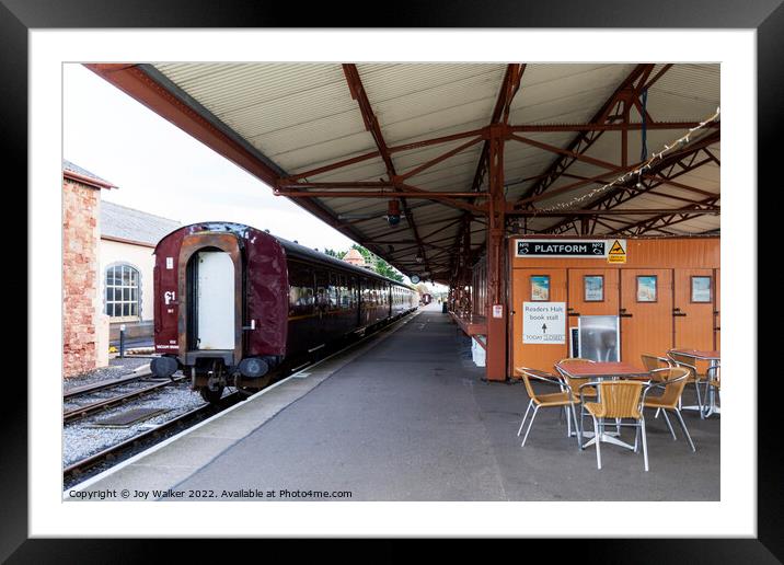 Minehead station, Somerset, UK with a stationary train  Framed Mounted Print by Joy Walker