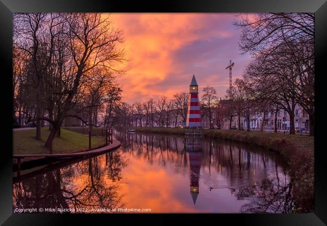 Lighthouse in dutch city of Breda by sunset	 Framed Print by Milos Ruzicka