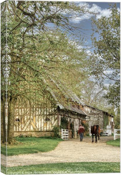 Tranquil Horse Stables in Rural Normandy Canvas Print by Roger Mechan