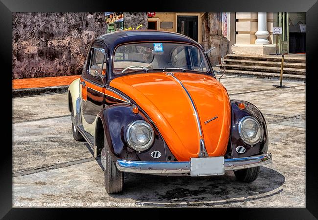 Black and orange vintage Volkswagen Beetle Framed Print by Kevin Hellon