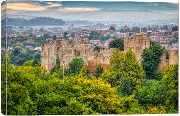 Castle ruins overlooking Ludlow Canvas Print by Roger Mechan