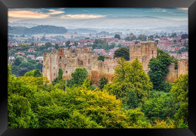 Castle ruins overlooking Ludlow Framed Print by Roger Mechan