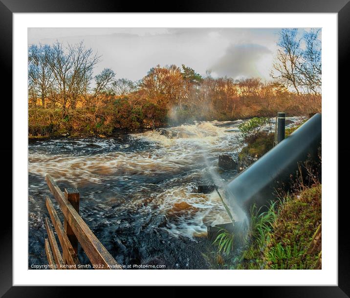 A corkscrew hydro-electric generator in operation Framed Mounted Print by Richard Smith