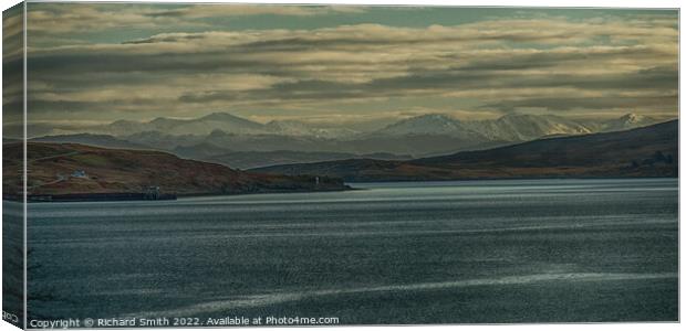 A view across the sea of distant snow covered hills. Canvas Print by Richard Smith