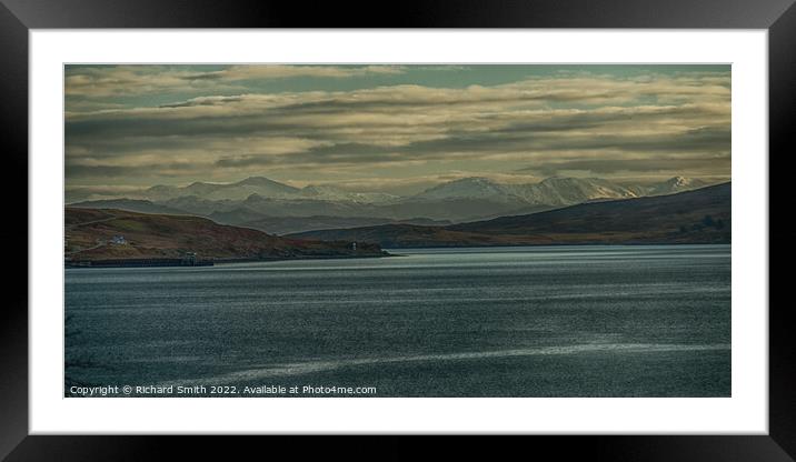A view across the sea of distant snow covered hills. Framed Mounted Print by Richard Smith