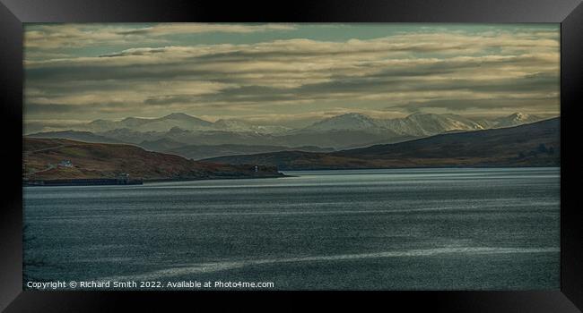 A view across the sea of distant snow covered hills. Framed Print by Richard Smith
