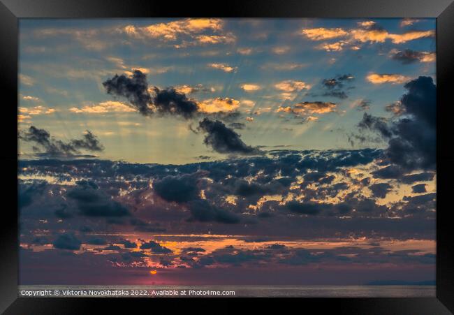Sunset in the clouds Framed Print by Viktoriia Novokhatska