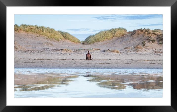 Iron Man reflecting in the wet sand Framed Mounted Print by Jason Wells