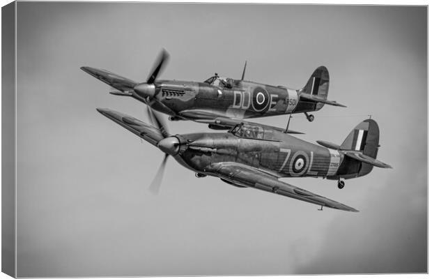 Hurricane and Spitfire Canvas Print by J Biggadike