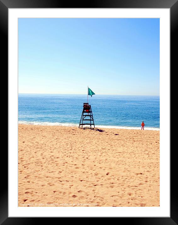 Lonely Lifeguard in portrait. Framed Mounted Print by john hill
