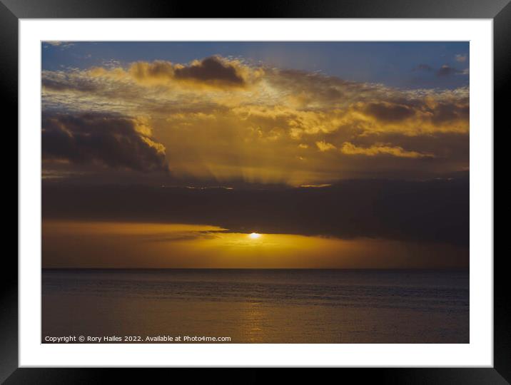The sun breaking through the cloud cover over the Bristol channel Framed Mounted Print by Rory Hailes