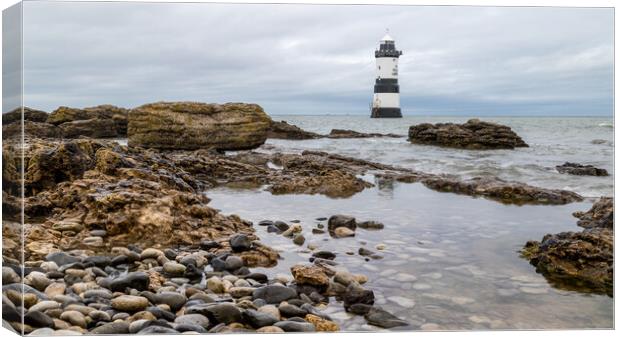 Pools of water by Penmon Lighthouse Canvas Print by Jason Wells