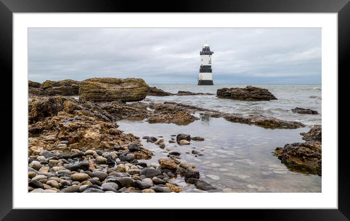 Pools of water by Penmon Lighthouse Framed Mounted Print by Jason Wells