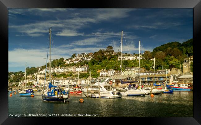 Yachts moored on the river in Looe, Cornwall Framed Print by Michael Shannon
