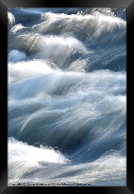 Fast flowing water Framed Print by Simon Johnson